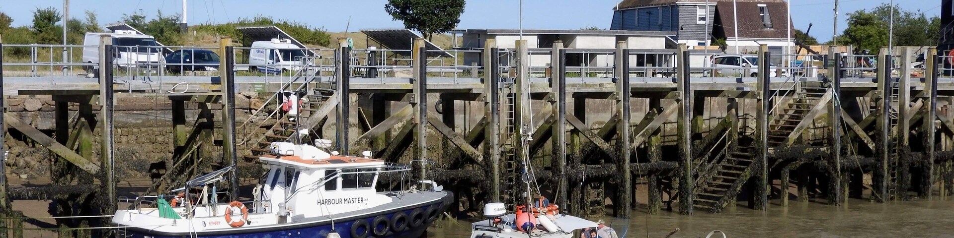 Rye Harbour is a two hundred year old village situated in southeast England. The harbour is also known for the tragedy of the Mary Stanford lifeboat. At 6:45 am on the morning of 15 November 1928, the Mary Stanford from the Rye Harbour RNLI station responded needlessly to a Latvian steamer in distress. The crew of the Mary Stanford did not know that the vessel had already been rescued by another lifeboat and, in heavy rain and seas, all of the seventeen-man crew of the Mary Stanford were drowned. The reason for this is still somewhat contested. The bodies of all but the Coxswain's son, John Head, were found and buried. A memorial service in honour of the Mary Stanford and its crew takes place every year in the village.
#History