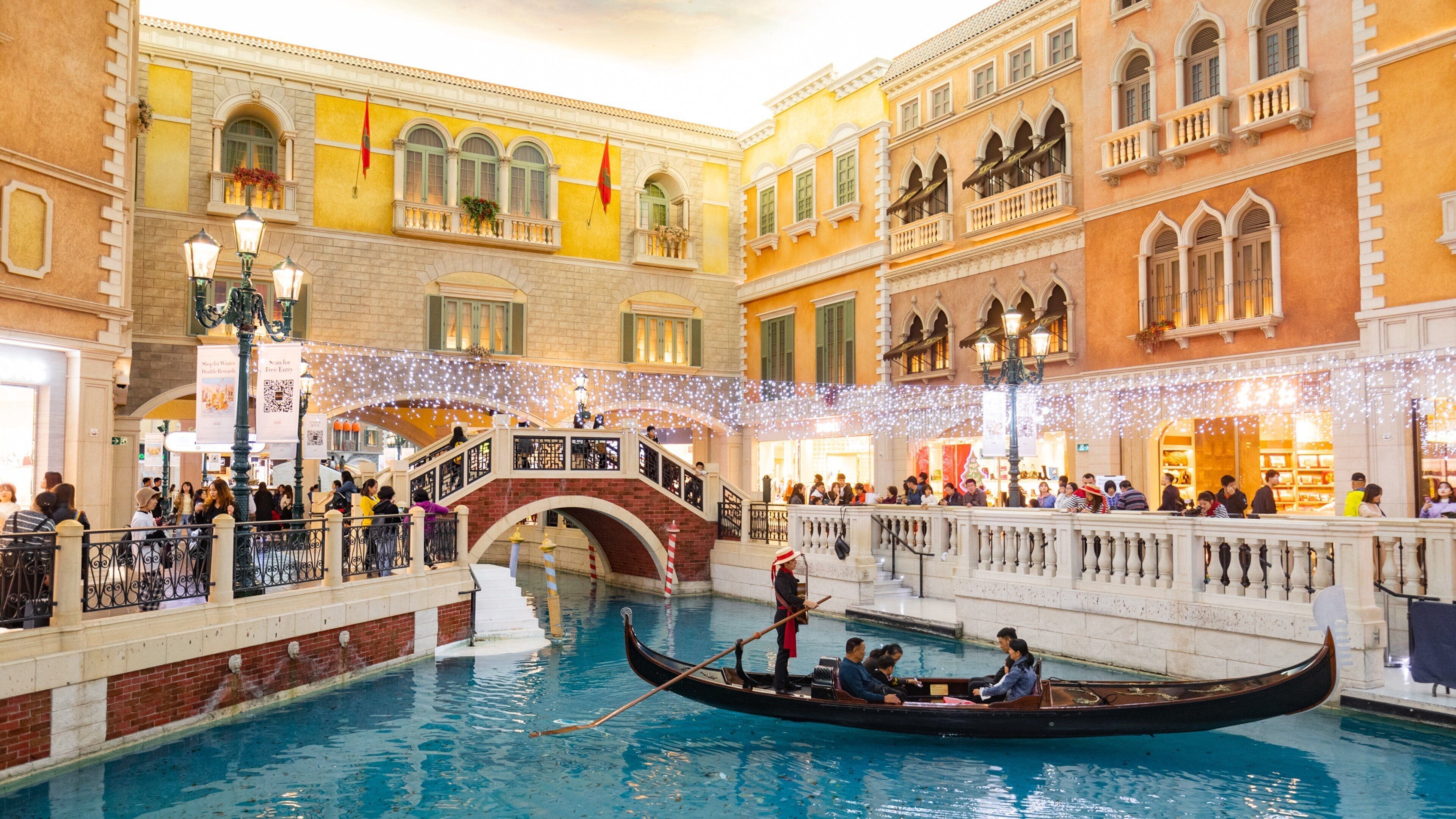 Venetian Macao Casino showing interior views, a river or creek and boating