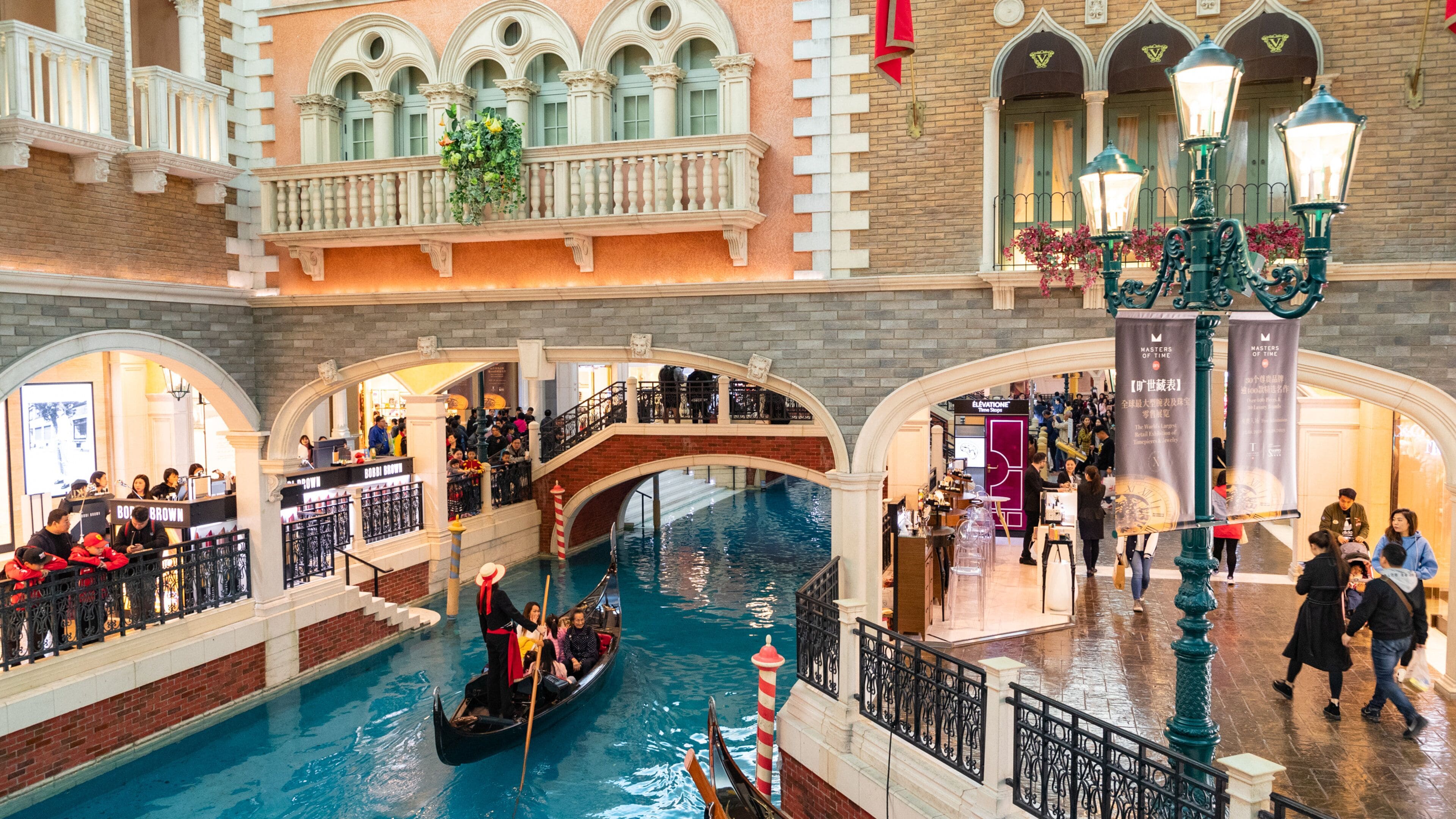Venetian Macao Casino showing interior views, boating and a river or creek