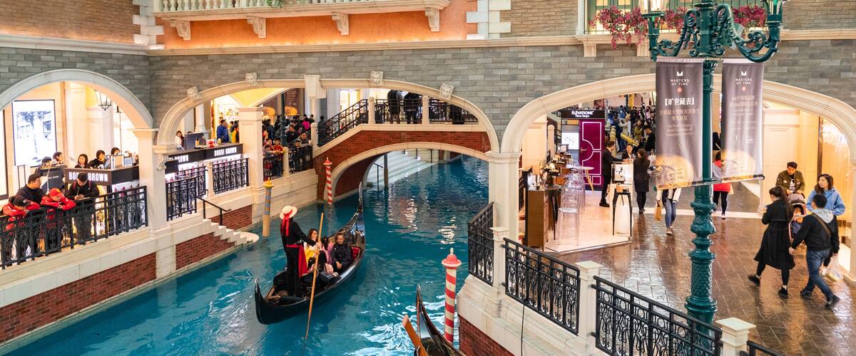 Venetian Macao Casino showing interior views, boating and a river or creek