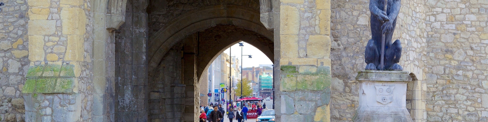 Old City Walls which includes a statue or sculpture and heritage architecture