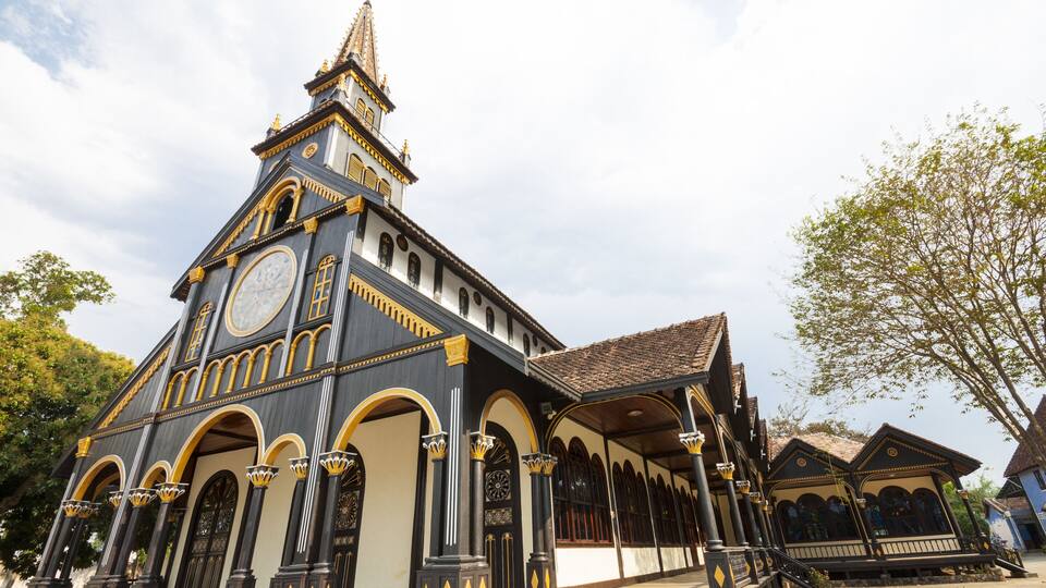Exterior of ancient Catholic wooden church in Kon Tum, Vietnam, Asia.