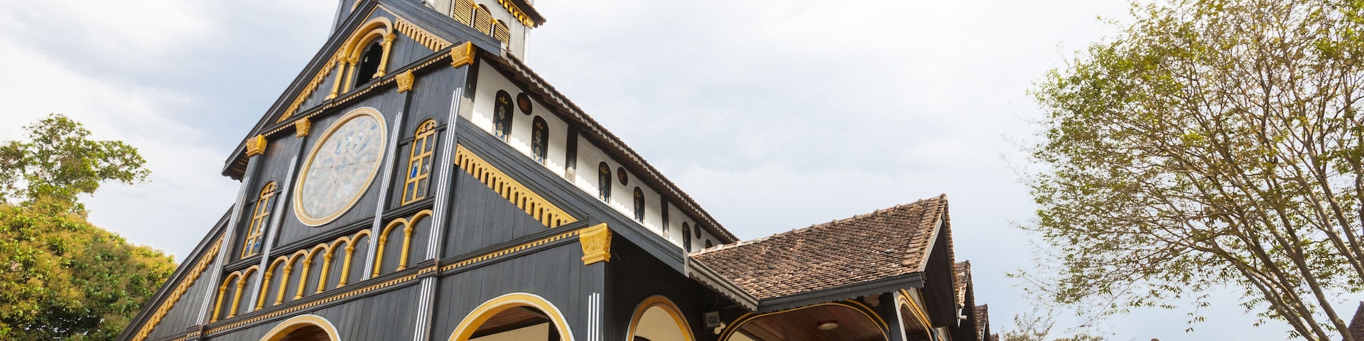 Exterior of ancient Catholic wooden church in Kon Tum, Vietnam, Asia.