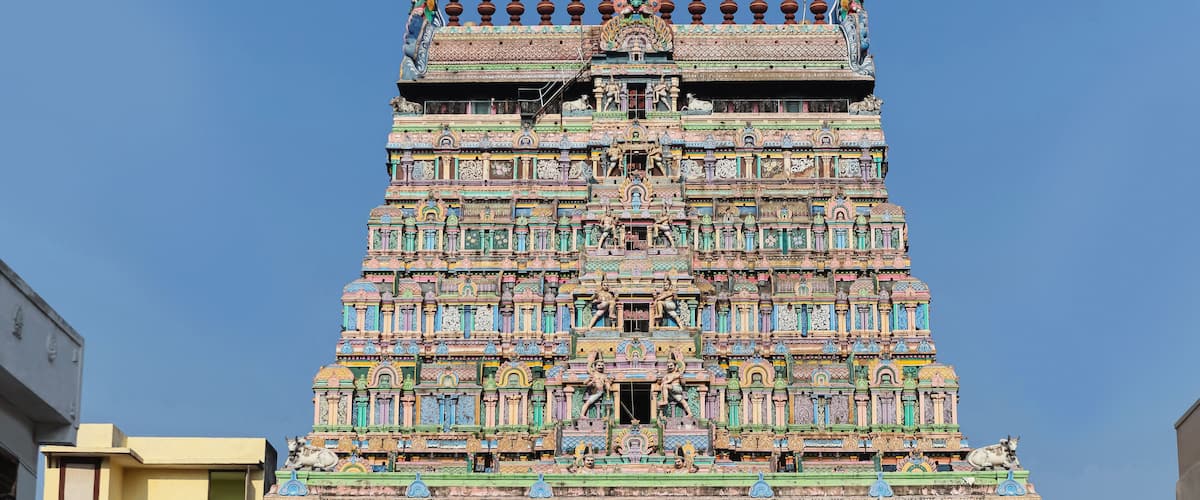 A colorful temple with intricate carvings and statues.