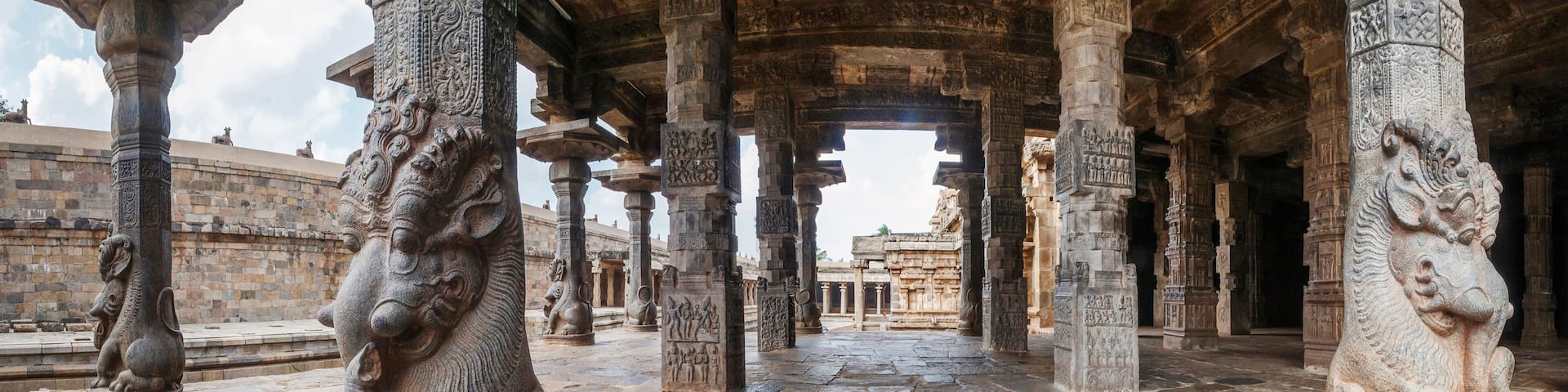 Elephants of the balustrades and galloping horses, Agra-mandapa, Airavatesvara Temple, Darasuram, Tamil Nadu, India.