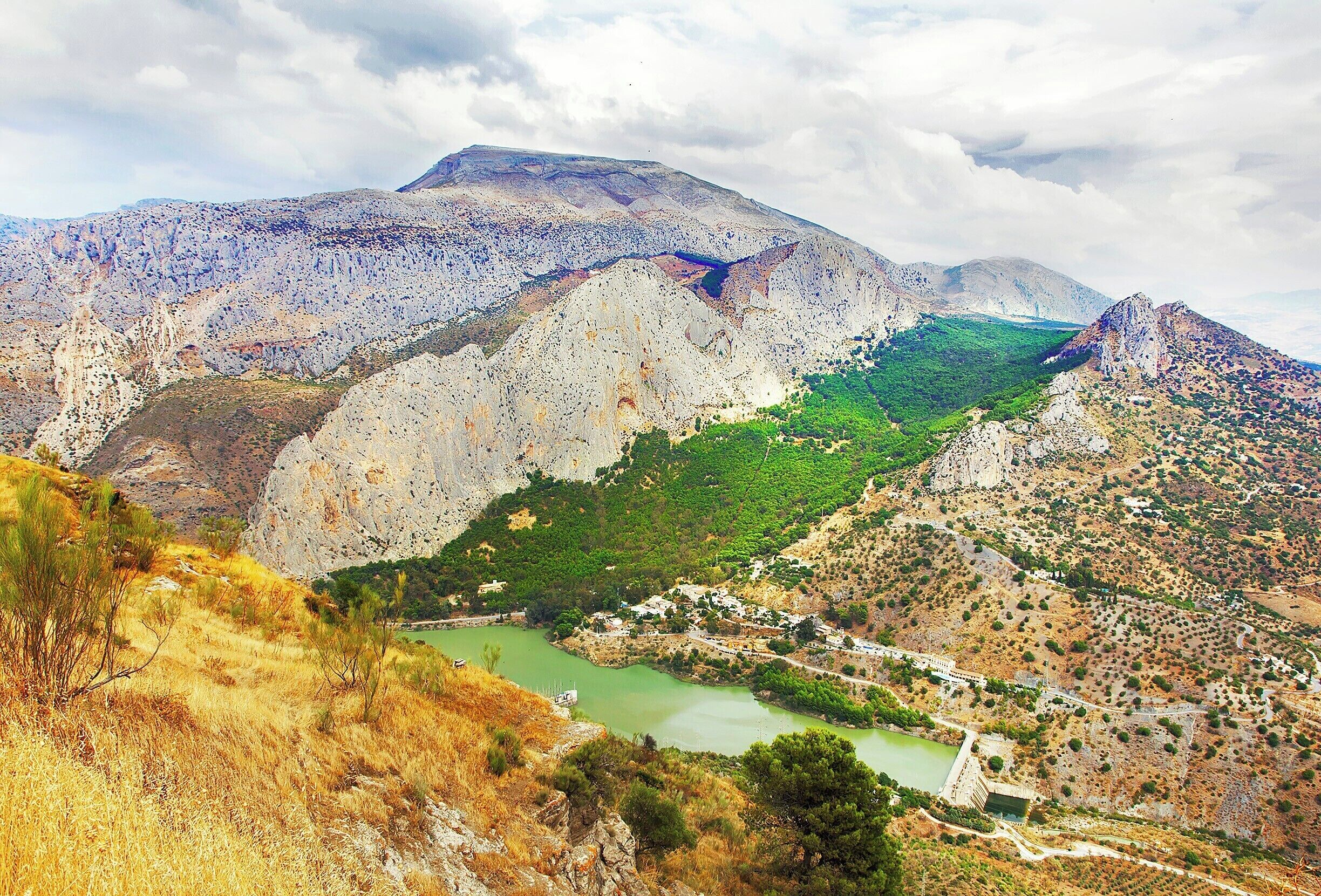 Millennia ago, this is where Africa collided with Europe.  The mountains to the left were formed by the collision, and the fertile (green) valley between the ridges was formed by deep sea deposits as the mountains on either side eroded and broke down.  Pretty cool to see the stark difference in vegetation between the ridges and just outside of them.

There are signs to get you to this particular viewpoint, and an English description of the scene once you get here.