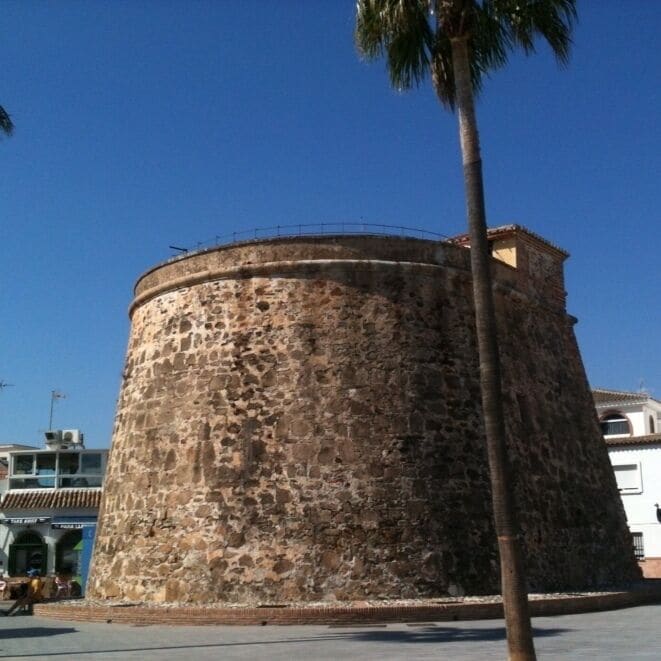 The Torre Arabe.

Although just off the main N340 road to the west of Fuengirola, this is an oasis of calm. 

Parking is a little fraught but there is a long sandy beach, and plenty of places to eat.