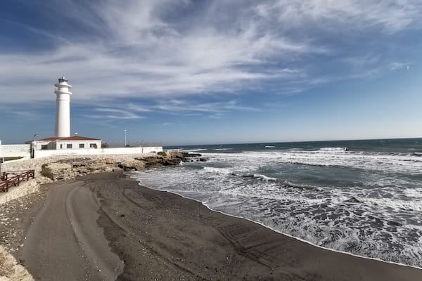 Lovely walk along dark sand beach