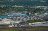 An airport with multiple runways and parked airplanes.