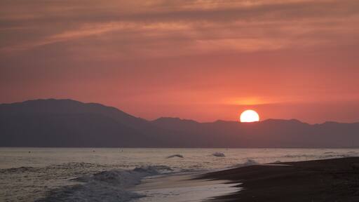 Sunset on the beach of Benajarafe. Malaga. Andalusia. Spain.