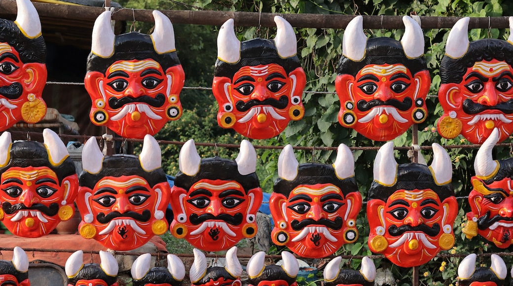 A Collection of Demon Masks in Vibrant colors usually displayed at homes to ward off evil spirits in India.