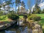 Dawes Arboretum Japanese Garden with Koi pond and water reflections on a sunny day