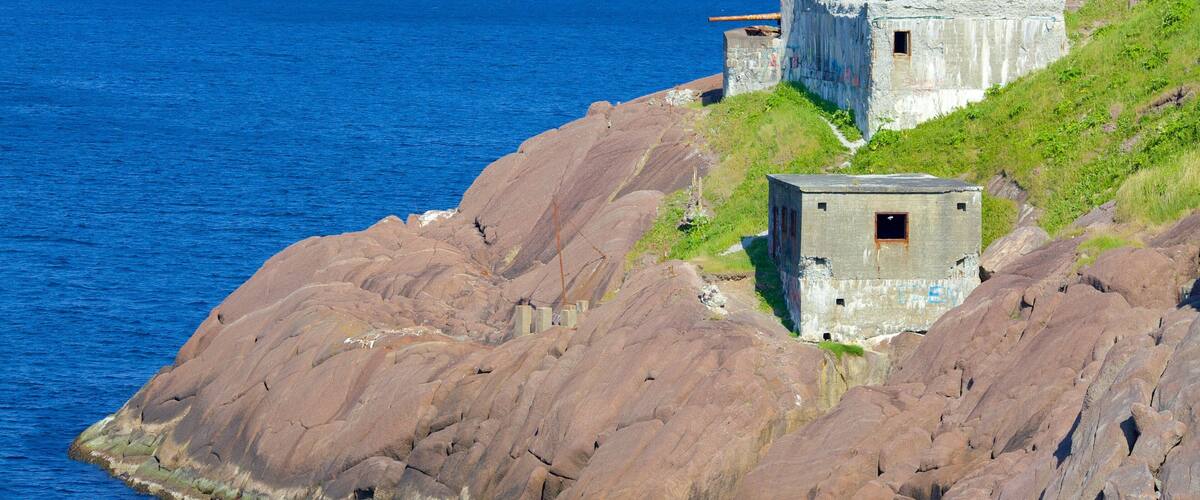 Fort Amherst which includes building ruins and general coastal views