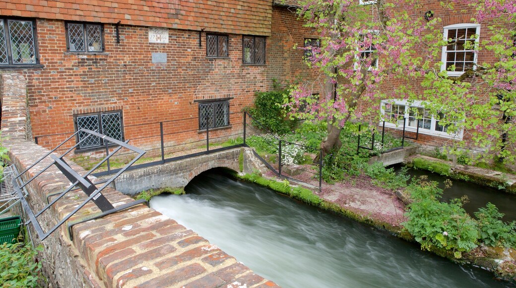 Winchester City Mill which includes a park, heritage architecture and a river or creek