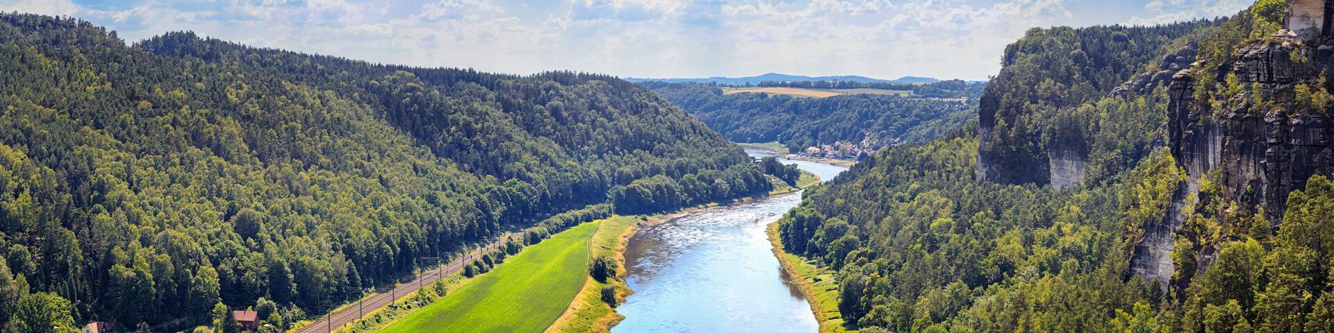 Beautiful landscape, panorama, banner - view of the Elbe river and Sandstone mountains in Saxon Switzerland National Park, Germany