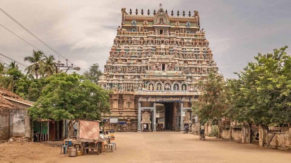 A large, ornate temple with intricate carvings and a prominent entrance.