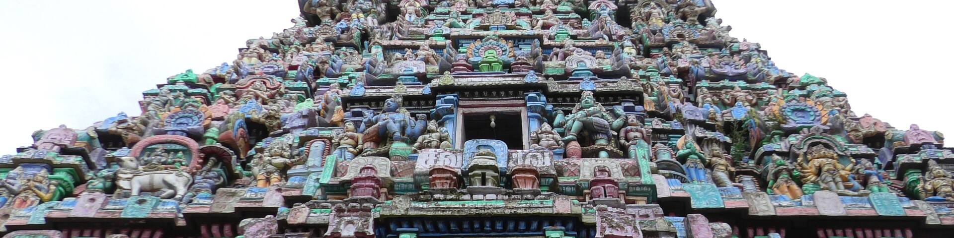 Closeup of the gateway tower full of colorful intricate carvings at Kasi Viswanathar Temple, Kumbakonam, Tamil Nadu, India