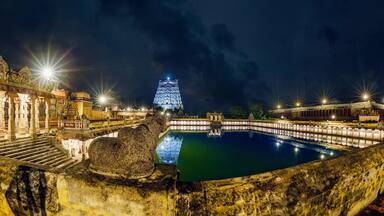 An ancient temple of India and lake night. Situated in Chidambaram, Tamilnadu. It's very famous temple of lord Shiva. Lots of people around the world come to visit this temple each year.