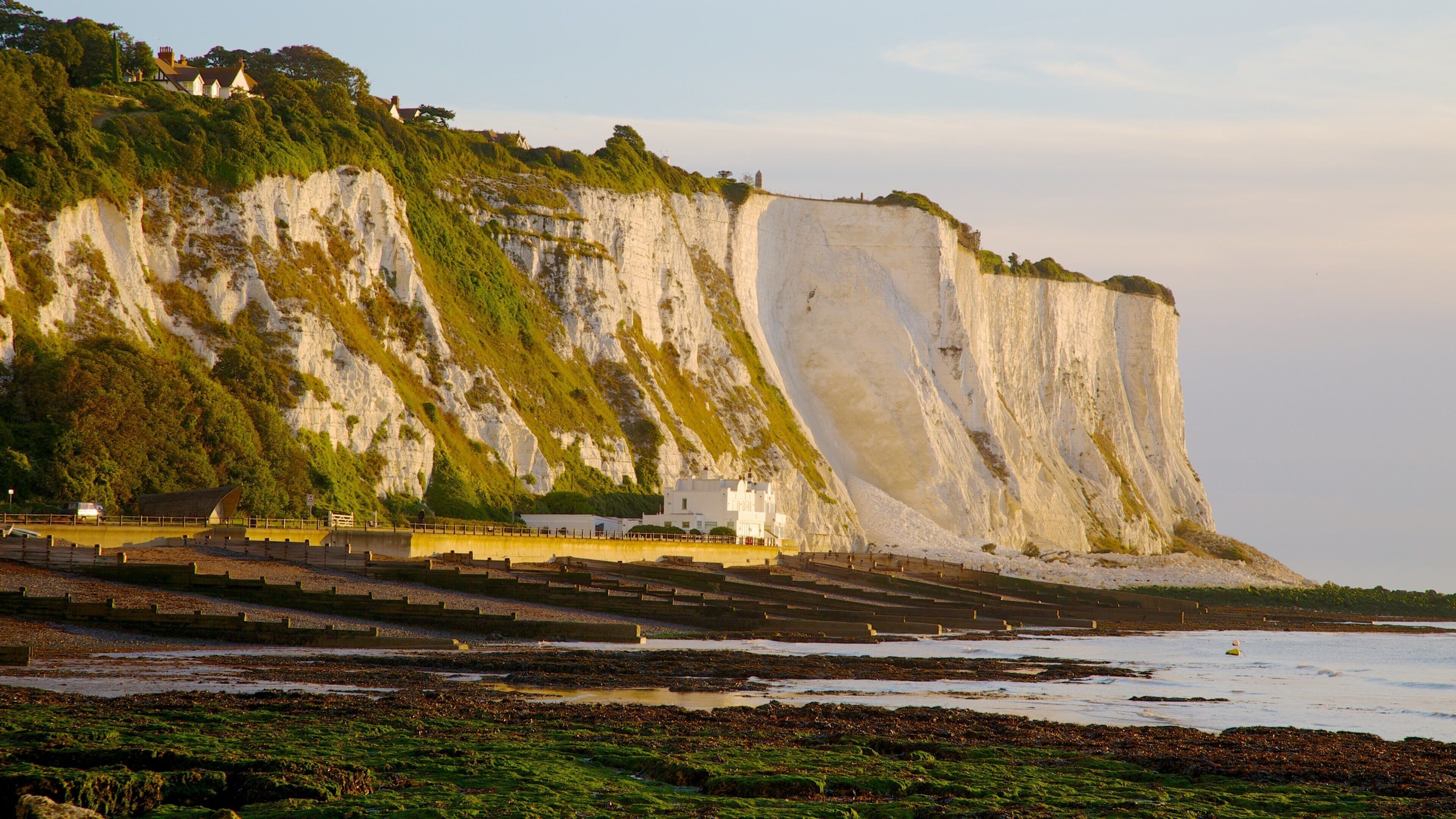 White Cliffs of Dover featuring rocky coastline, landscape views and a pebble beach
