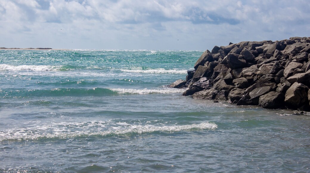 Arichal Munai (near Dhanushkodi) is the southern tip of Rameswaram Island in Tamil Nadu, India, It is a unique geographical point where the Bay of Bengal and the Indian Ocean converge