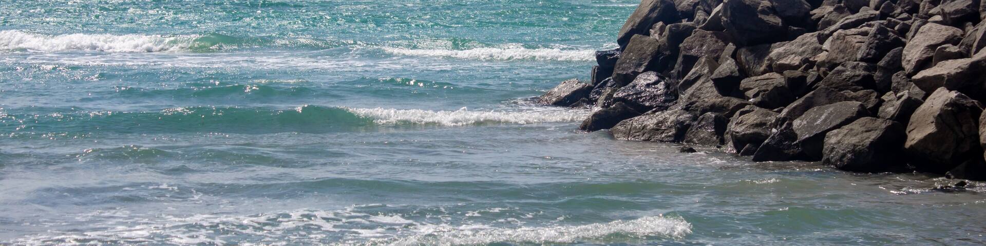 Arichal Munai (near Dhanushkodi) is the southern tip of Rameswaram Island in Tamil Nadu, India, It is a unique geographical point where the Bay of Bengal and the Indian Ocean converge