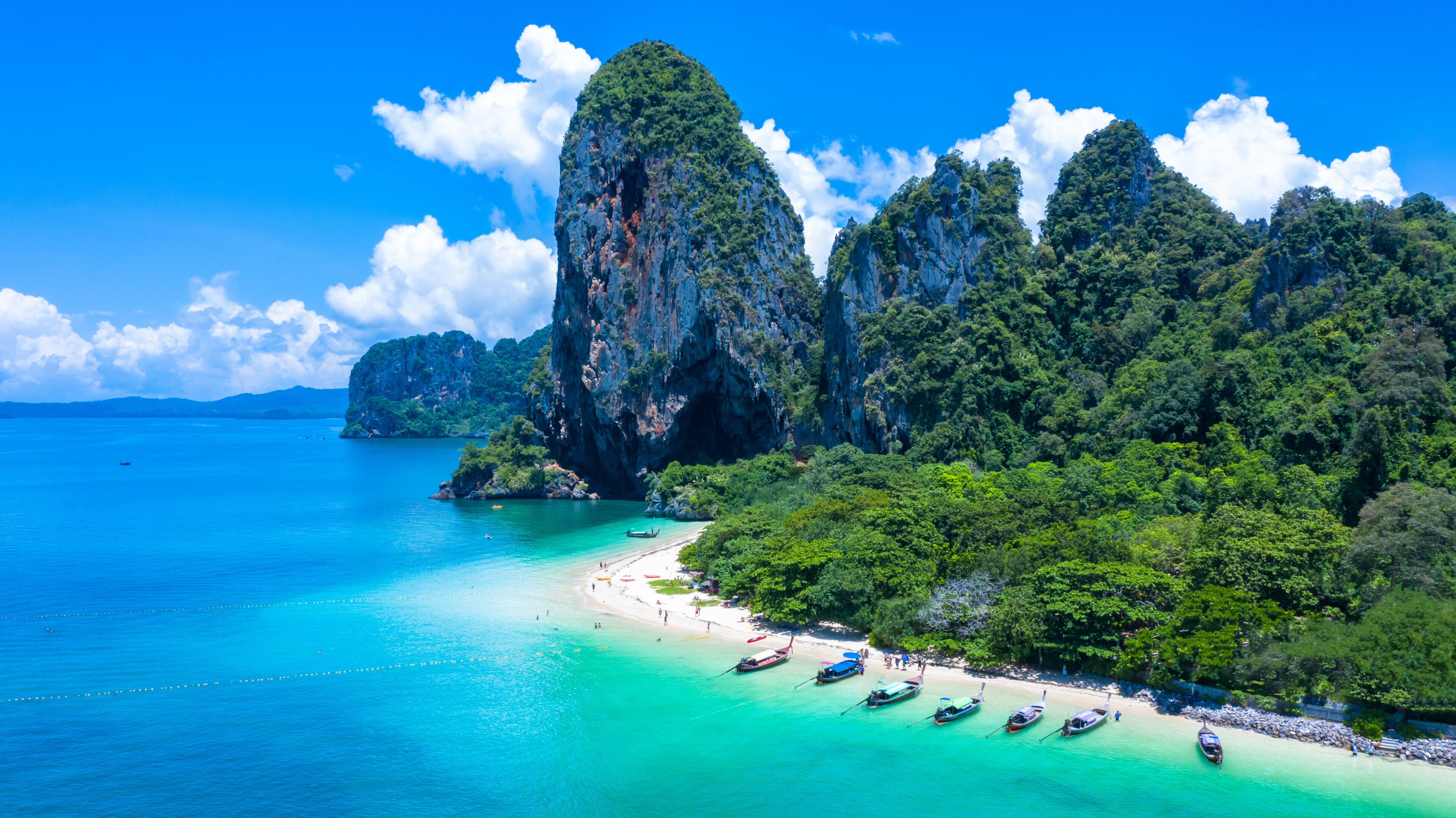 Aerial view Phra Nang Cave Beach with traditional long tail boat on Ao Phra Nang Beach, Railay Bay, Krabi, Thailand.