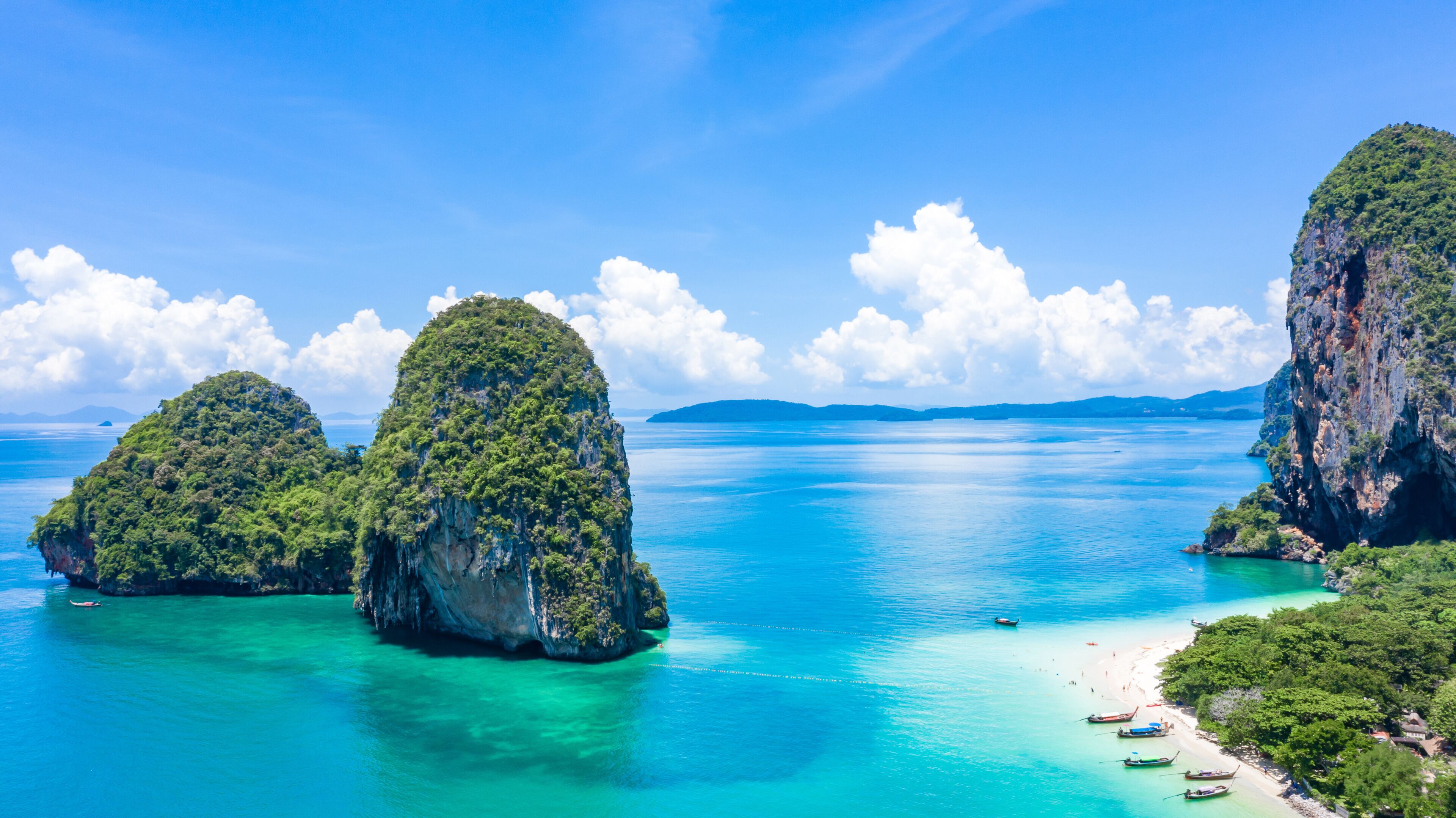 Aerial view Phra Nang Cave Beach with traditional long tail boat on Ao Phra Nang Beach, Railay Bay, Krabi, Thailand.