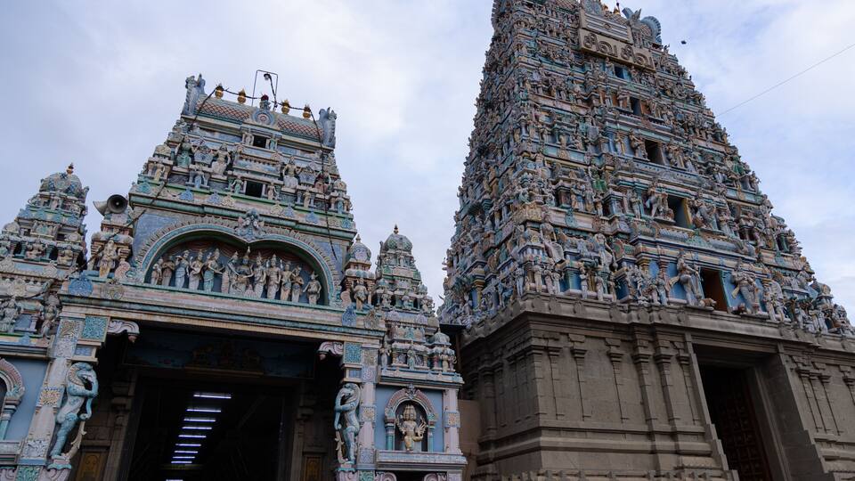 A temple with intricate carvings and multiple spires.
