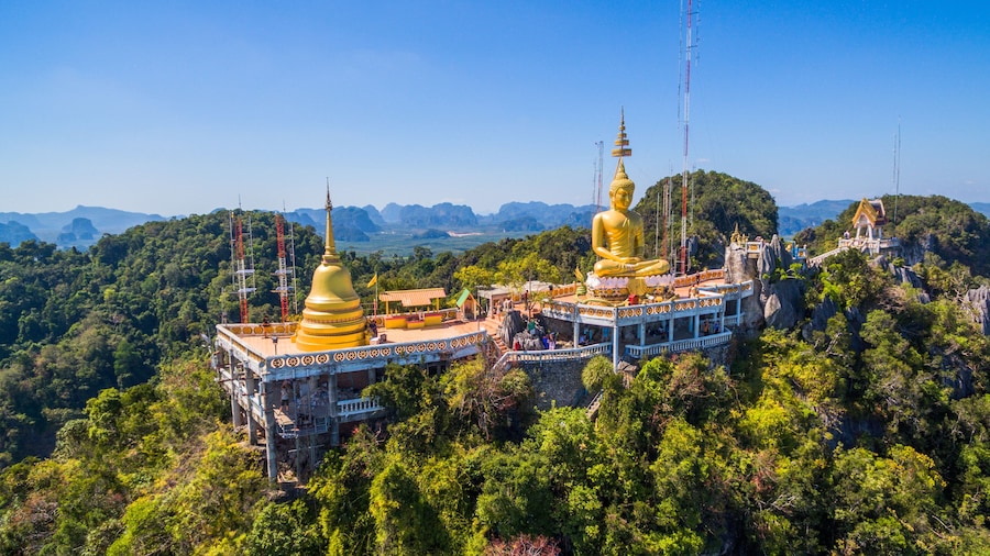 pagodas beside stair along the way to hilltop
of Wat Thumsuar or Tiger cave temple in Krabi province Thaiuland the highest temple in the south of Thailand