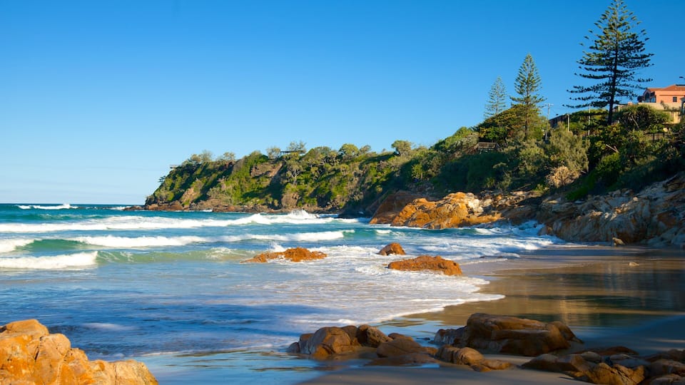 Coolum Beach which includes a beach and rugged coastline