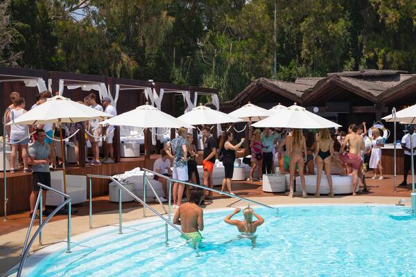 Funny Beach showing a pool and swimming as well as a couple