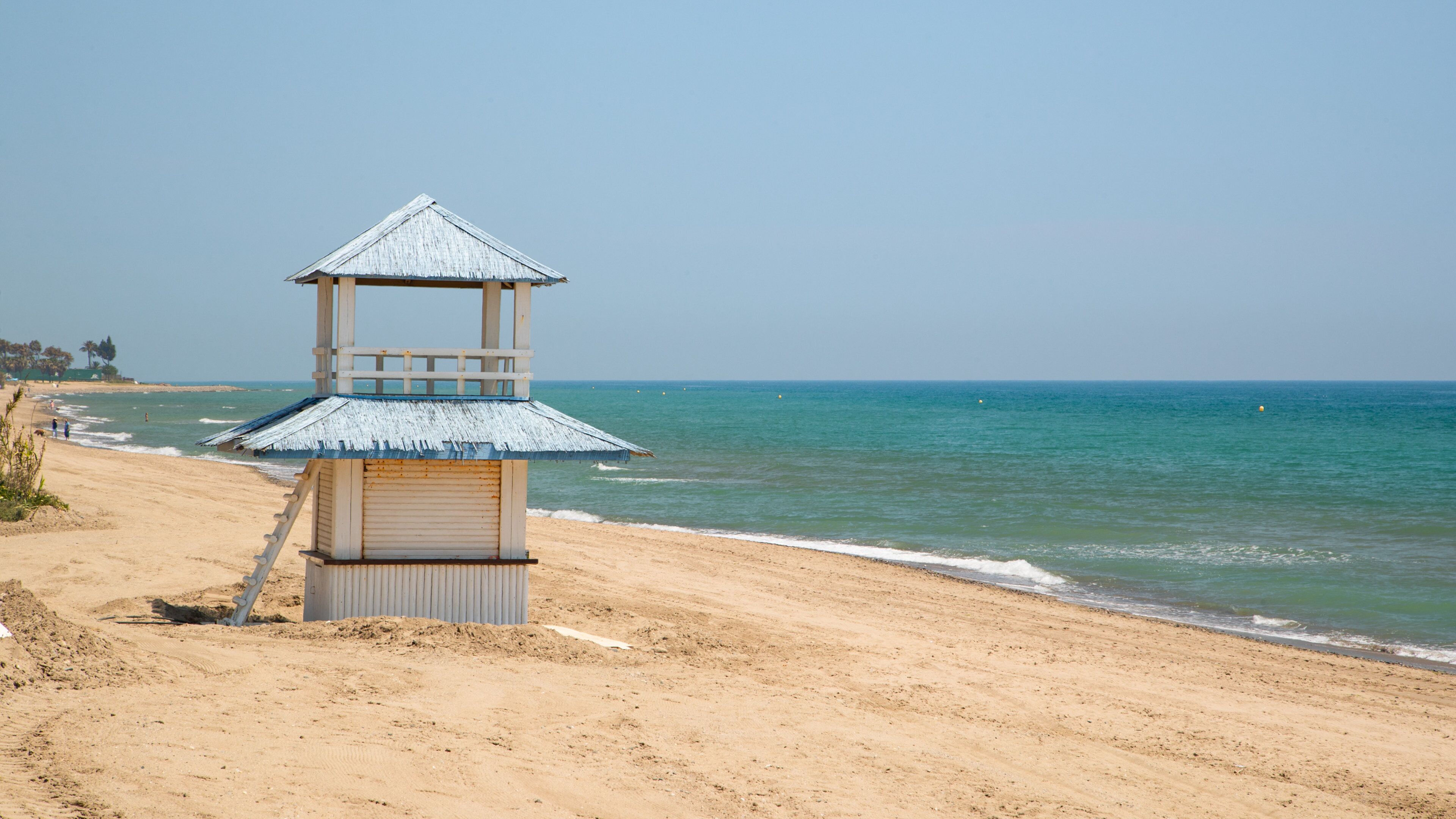 El Pinillo Beach which includes a beach and general coastal views