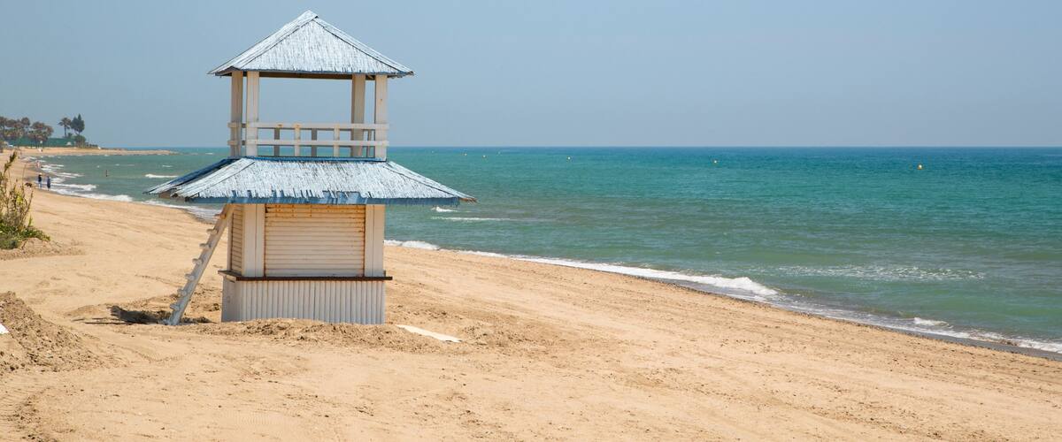 El Pinillo Beach which includes a beach and general coastal views
