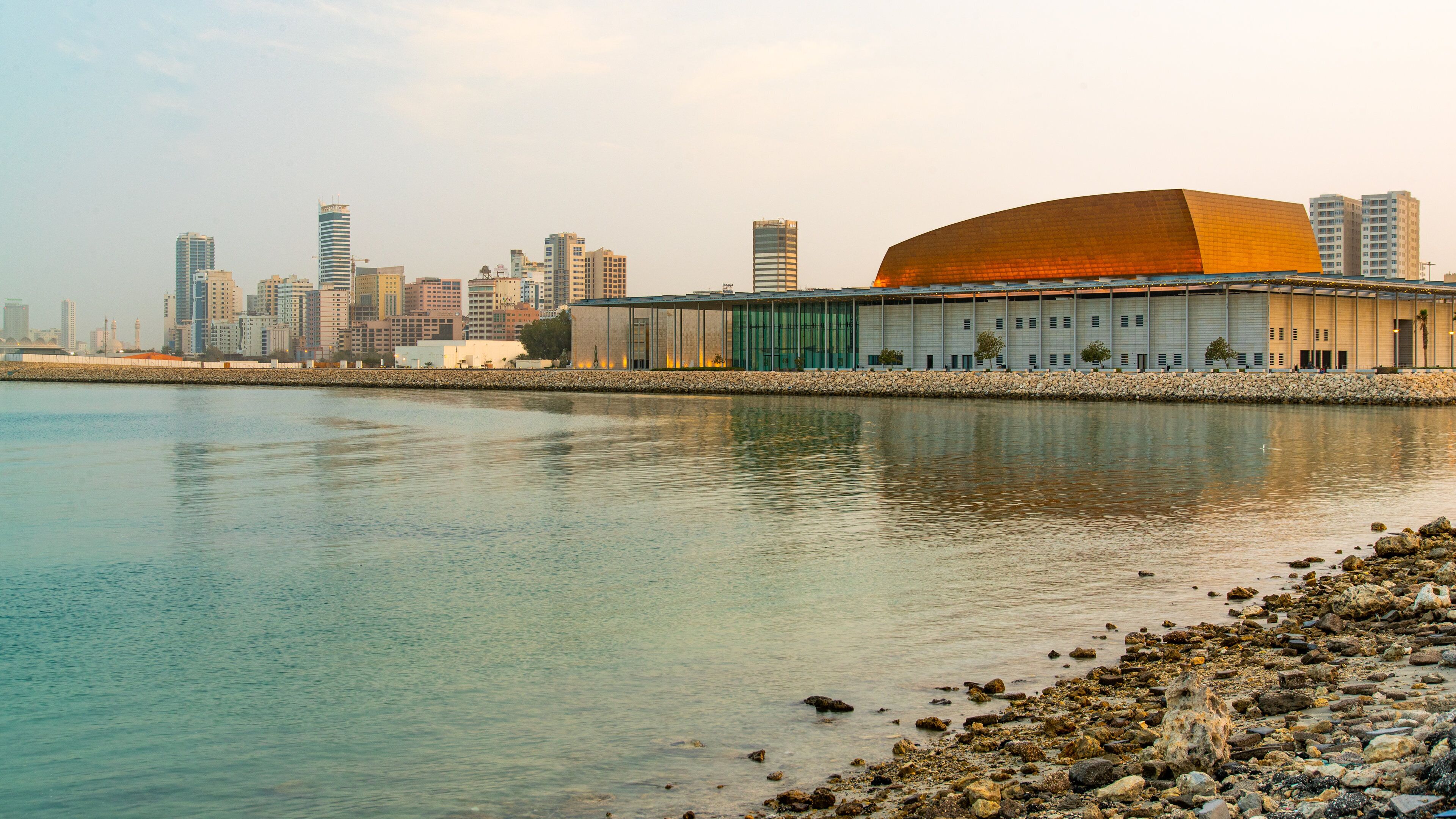Bahrain National Theater featuring general coastal views and a city