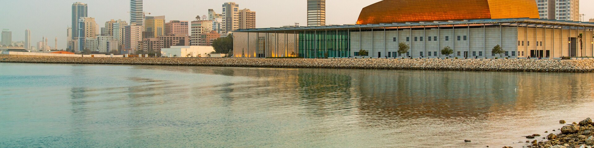 Bahrain National Theater featuring general coastal views and a city