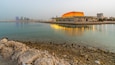 Bahrain National Theater which includes a bay or harbor