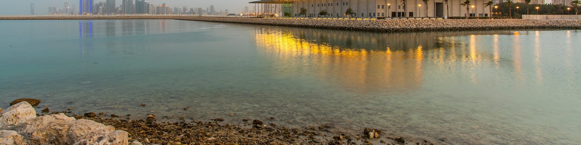 Bahrain National Theater which includes a bay or harbor