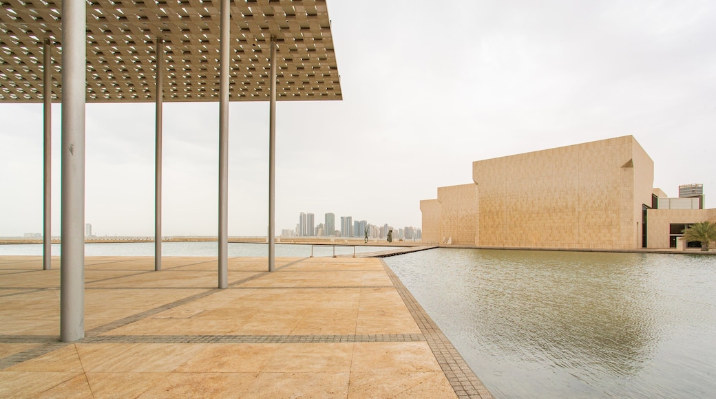 Bahrain National Theater which includes a pond