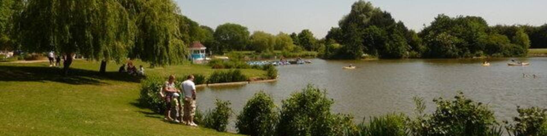 Swanley: Swanley Park lake A picturesque lake towards the eastern side of Swanley Park. Out of picture to the left are children's playthings and a café/refreshment building, all making this a very popular spot on a hot, sunny Saturday afternoon during half term.