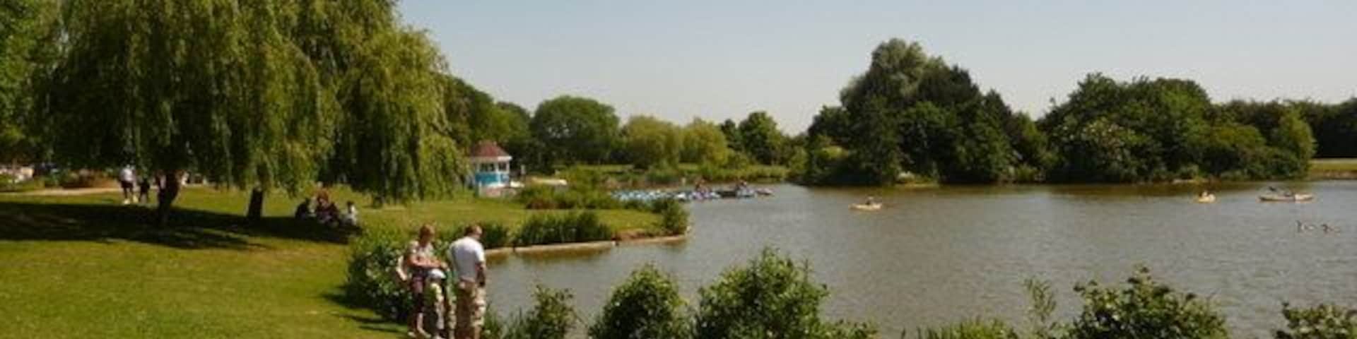 Swanley: Swanley Park lake A picturesque lake towards the eastern side of Swanley Park. Out of picture to the left are children's playthings and a café/refreshment building, all making this a very popular spot on a hot, sunny Saturday afternoon during half term.