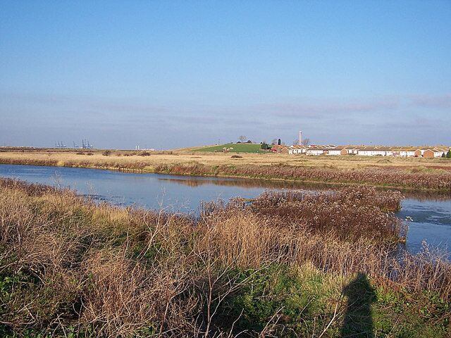Rushenden Marsh Looking back towards Rushenden Hill and Rushenden Village from the gateway to Queenborough Water Treatment Works.
