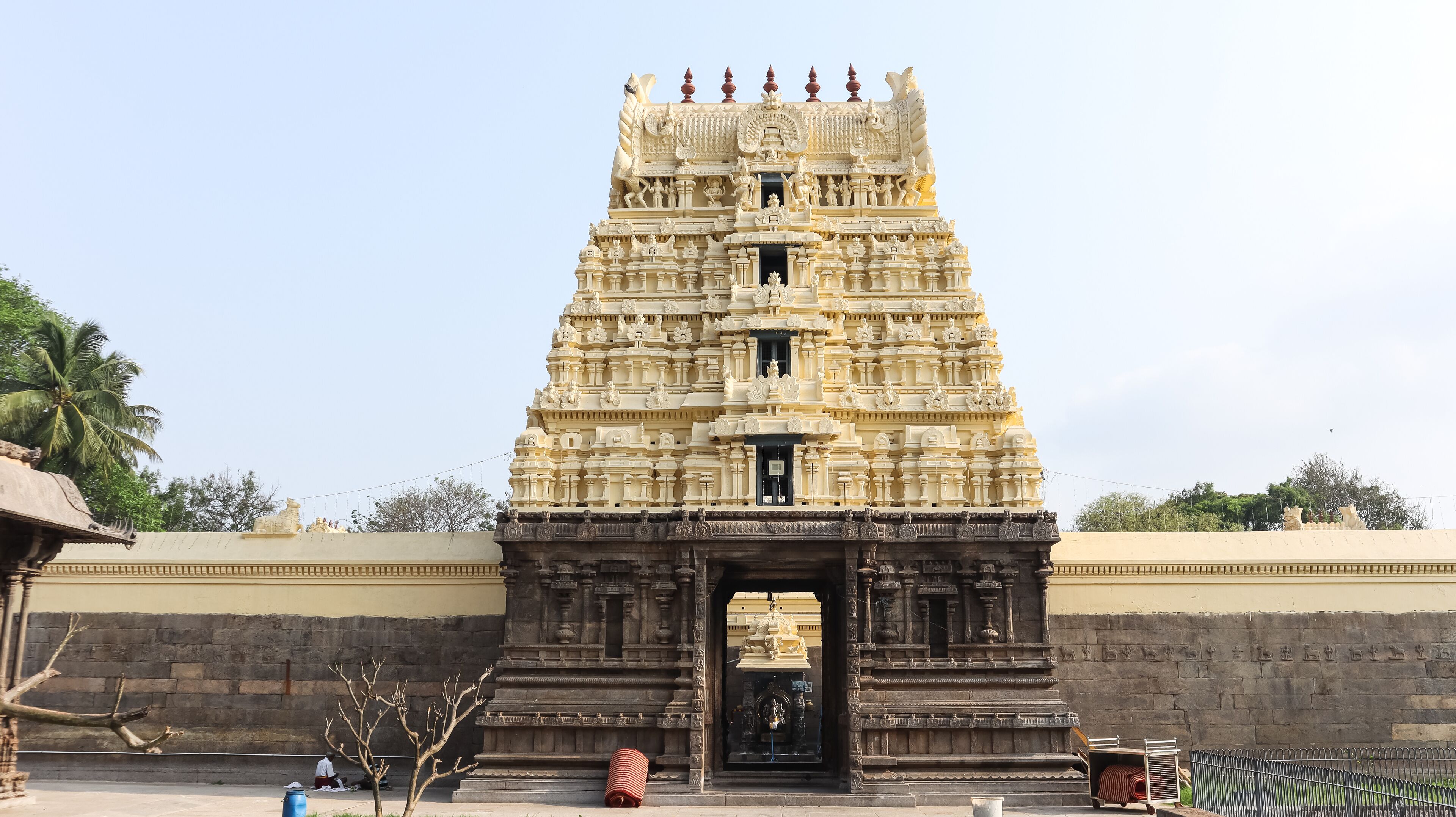 A detailed temple with intricate carvings and a large entrance.