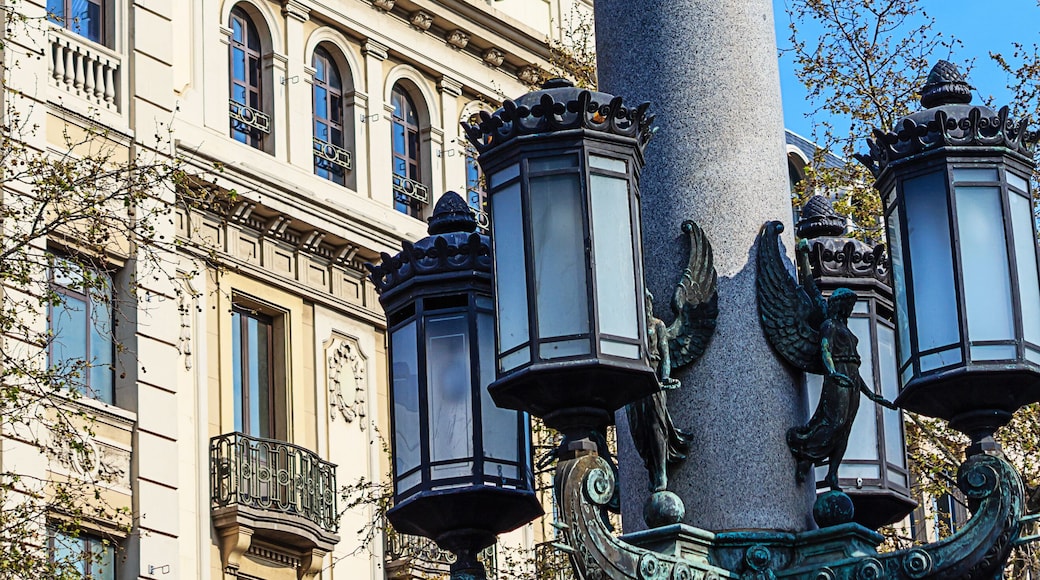 Old tall street lamp on the Catalonia square in Barcelona, Spain