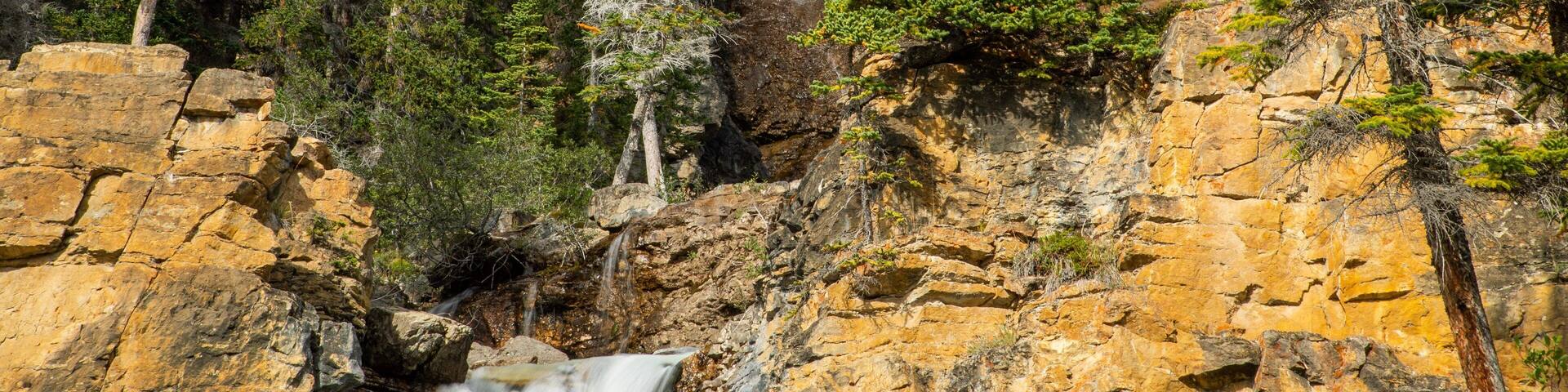 Tangle Falls showing modern architecture and a waterfall