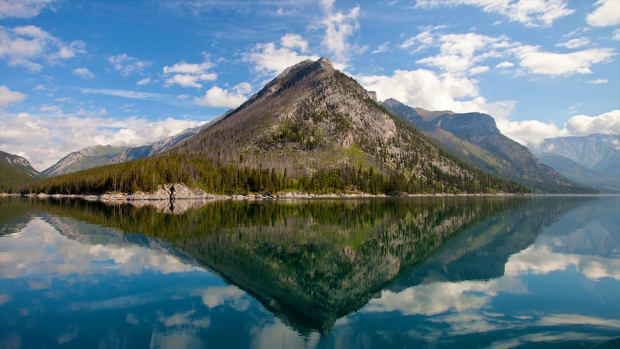 Lake Minnewanka featuring landscape views and mountains