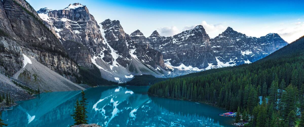 I'm pretty sure everyone in Canada who has ever been to Banff National Park has a photo something like this. However, if you've never been there in person, photographs in my opinion cannot do Moraine Lake justice.
Moraine Lake is very difficult to get to during the summer due to its small parking lot and high popularity. I suggest getting there either super early, or around 7-8 PM to take advantage of sunset.
That said, this is one of my most favorite places to photograph due to the amazing blue water and mountainous backdrop. Come see it for yourself!