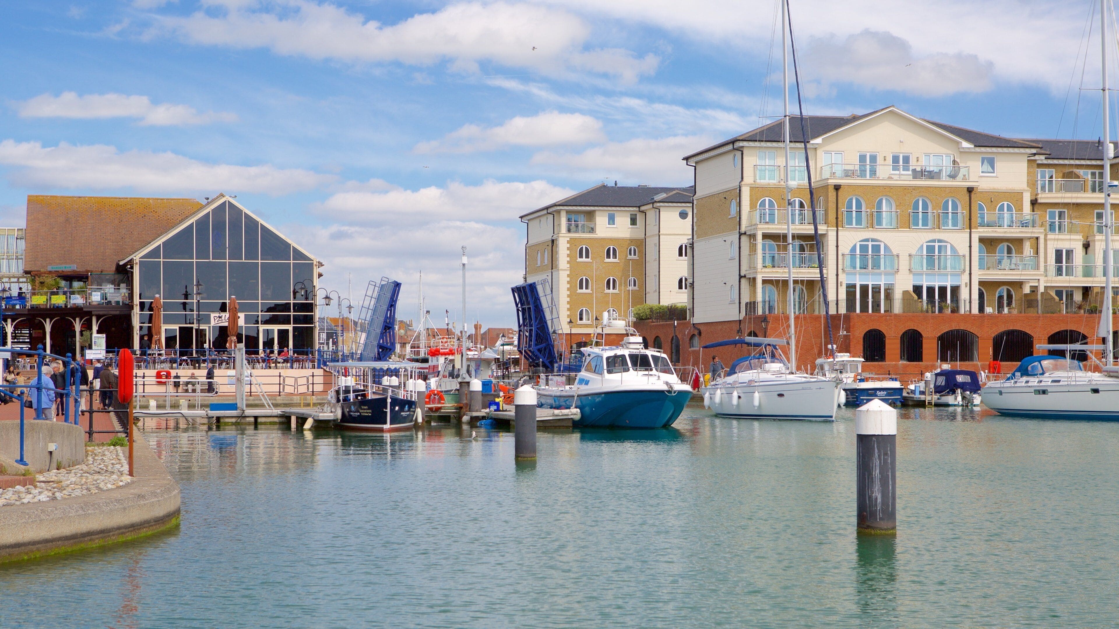 Sovereign Harbour featuring a bay or harbour and a city