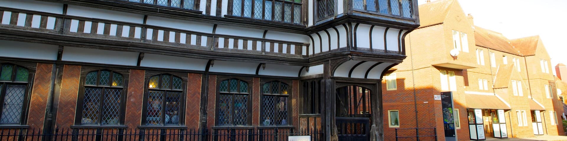 Tudor House and Garden showing heritage architecture, a small town or village and a house