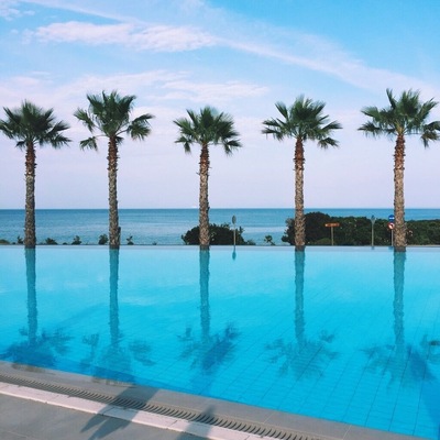 A beautiful luxury hotel in Skala, Kefalonia! With views like this onto the beach how could you resist! #beachtips #palms #greece