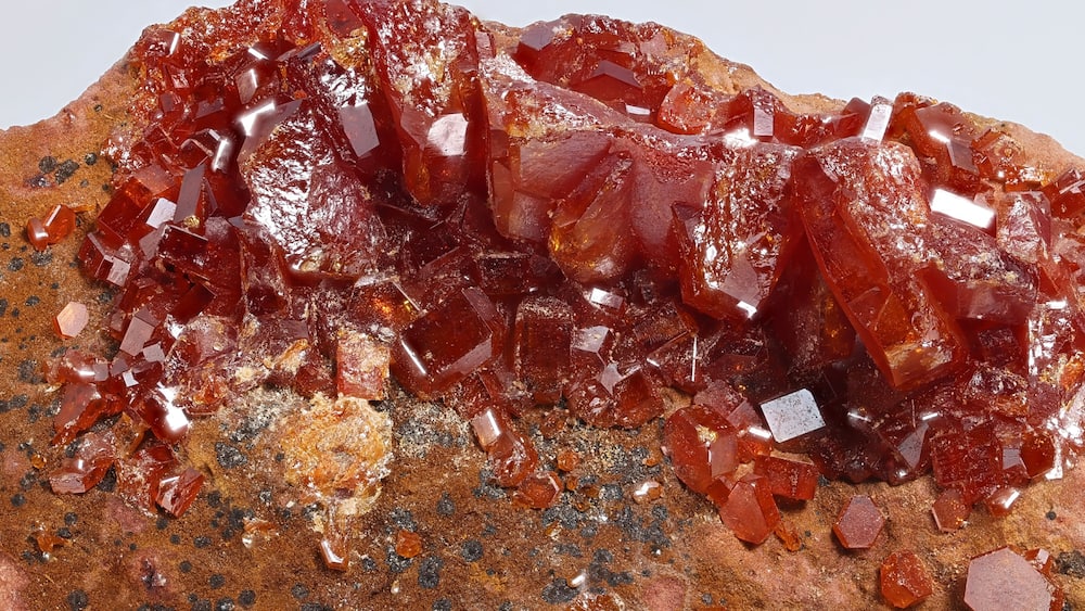 Red crystals of vanadinite. Vanadinite is a phosphate mineral and one of the main industrial ores of the metal vanadium